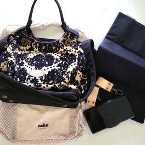 Petunia Pickle Bottom Society Licorice Pudding Cake Satchel